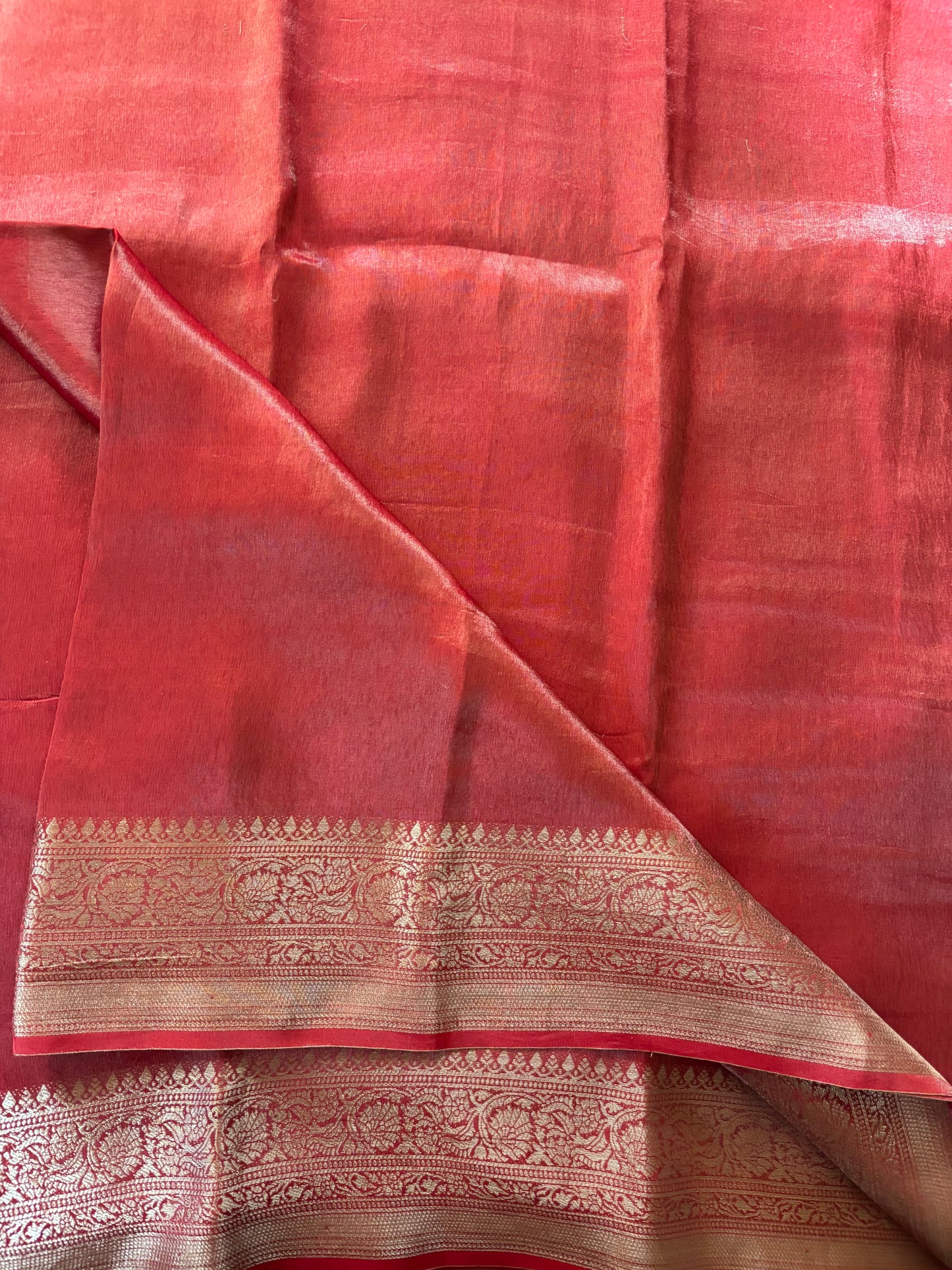Rust orange satin tissue saree
