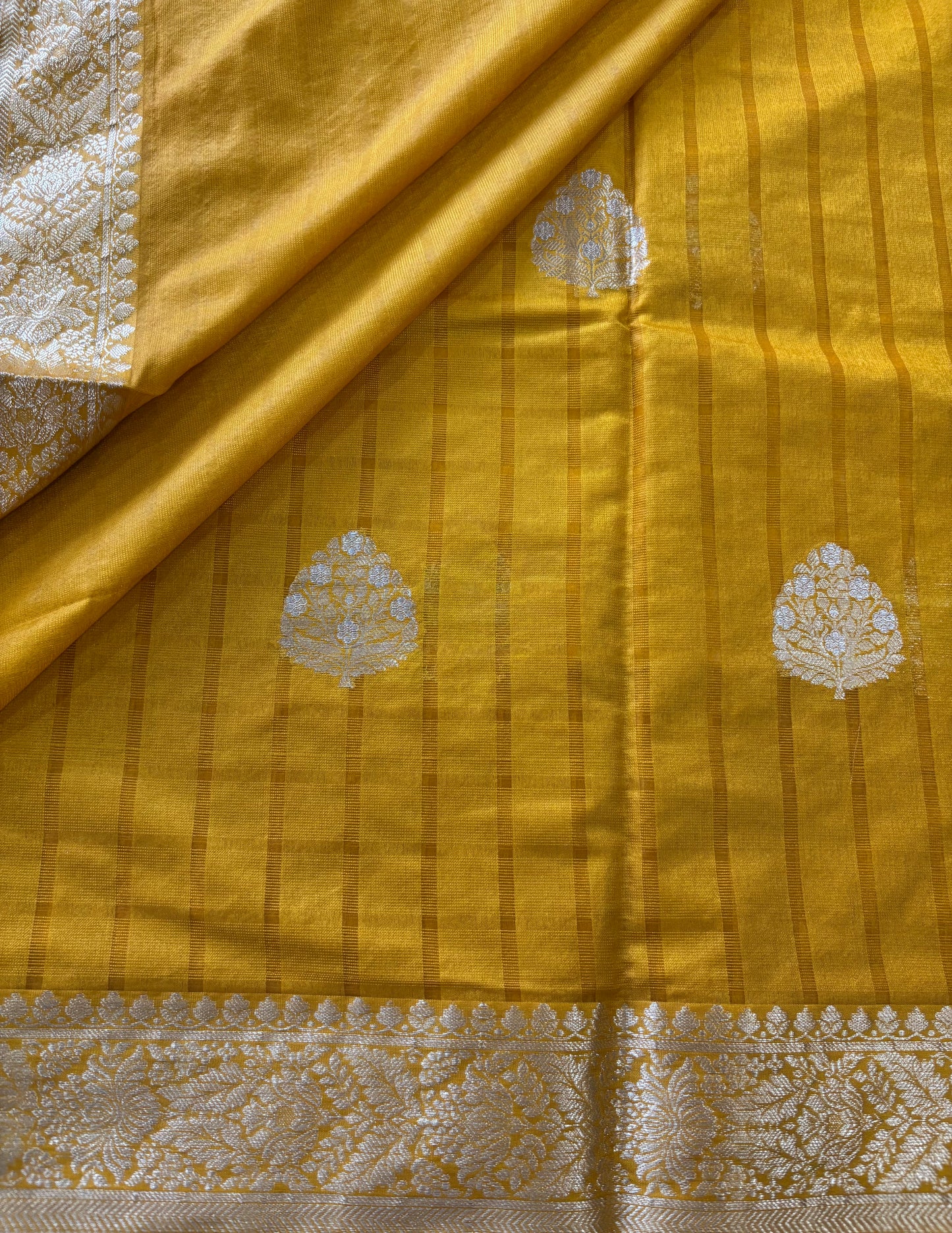 Mustard yellow Chinnon checks saree