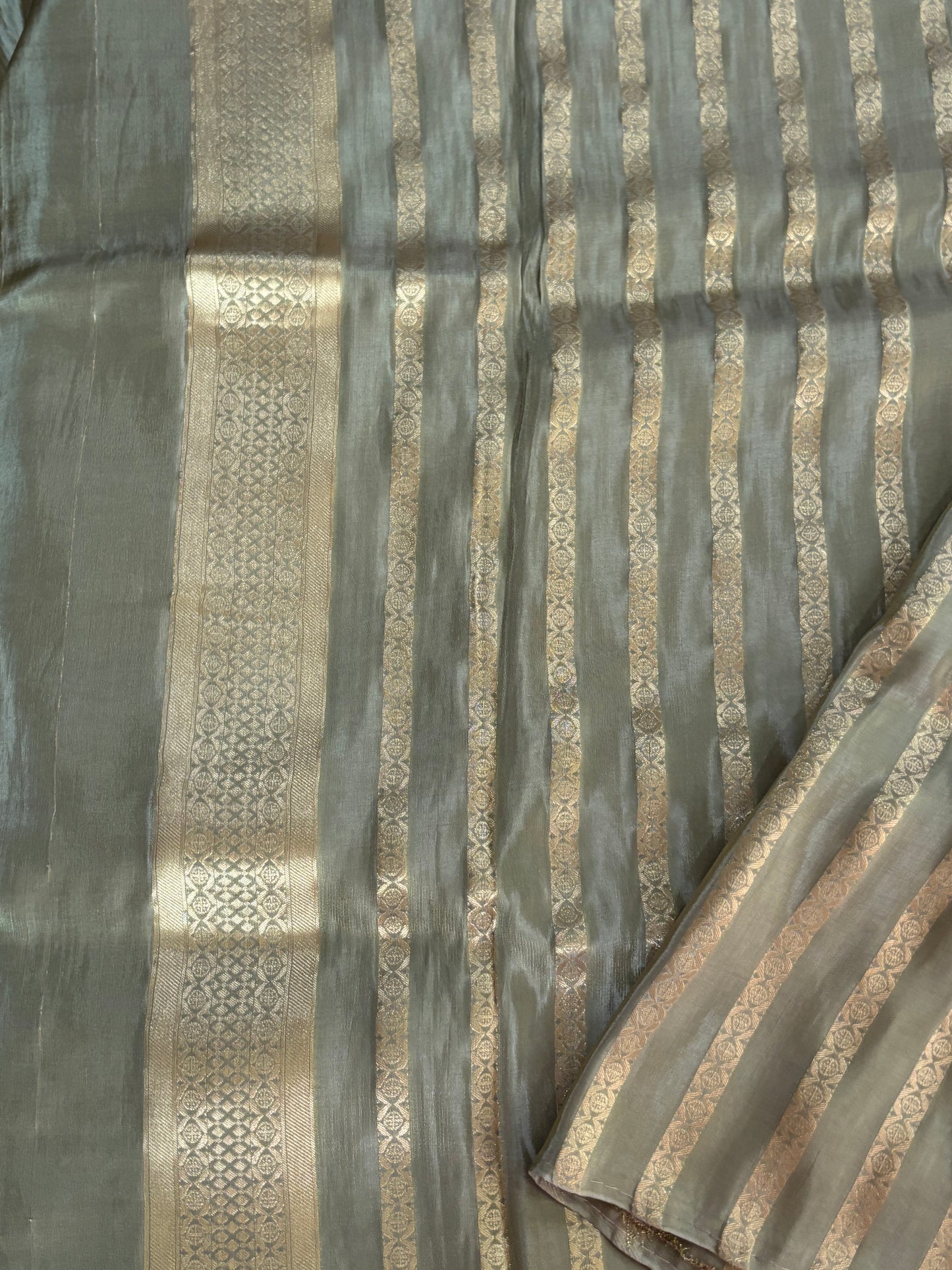 Olive green chinnon tissue silk saree