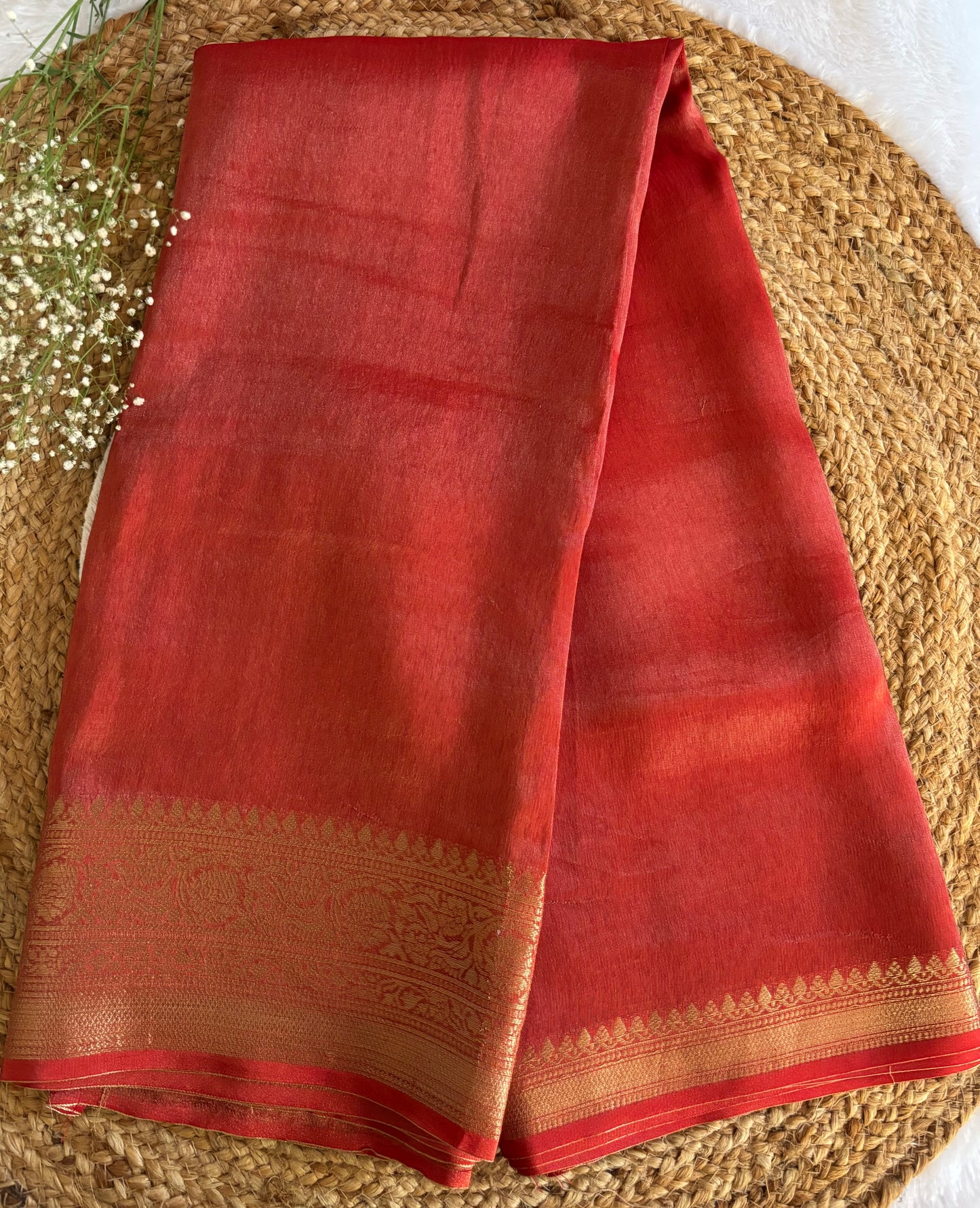 Rust orange satin tissue saree